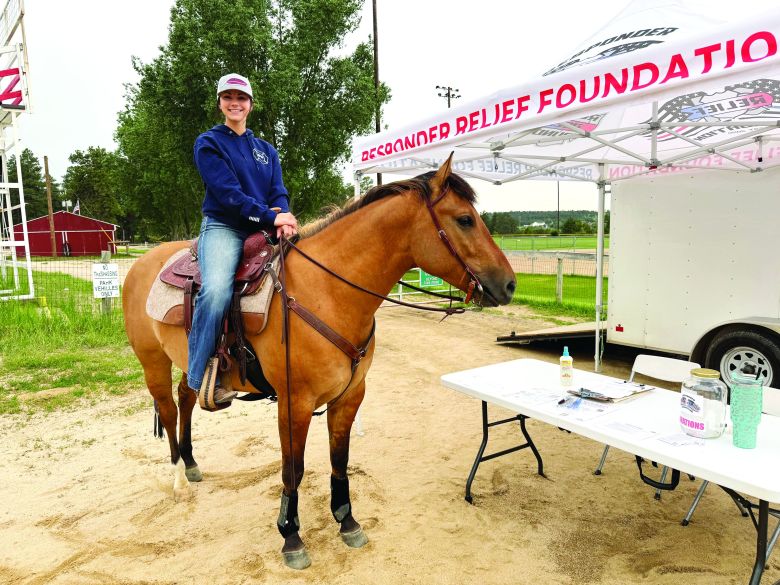 Responder Relief Rodeo Queen Madison Montoya sits atop her horse, Juan.